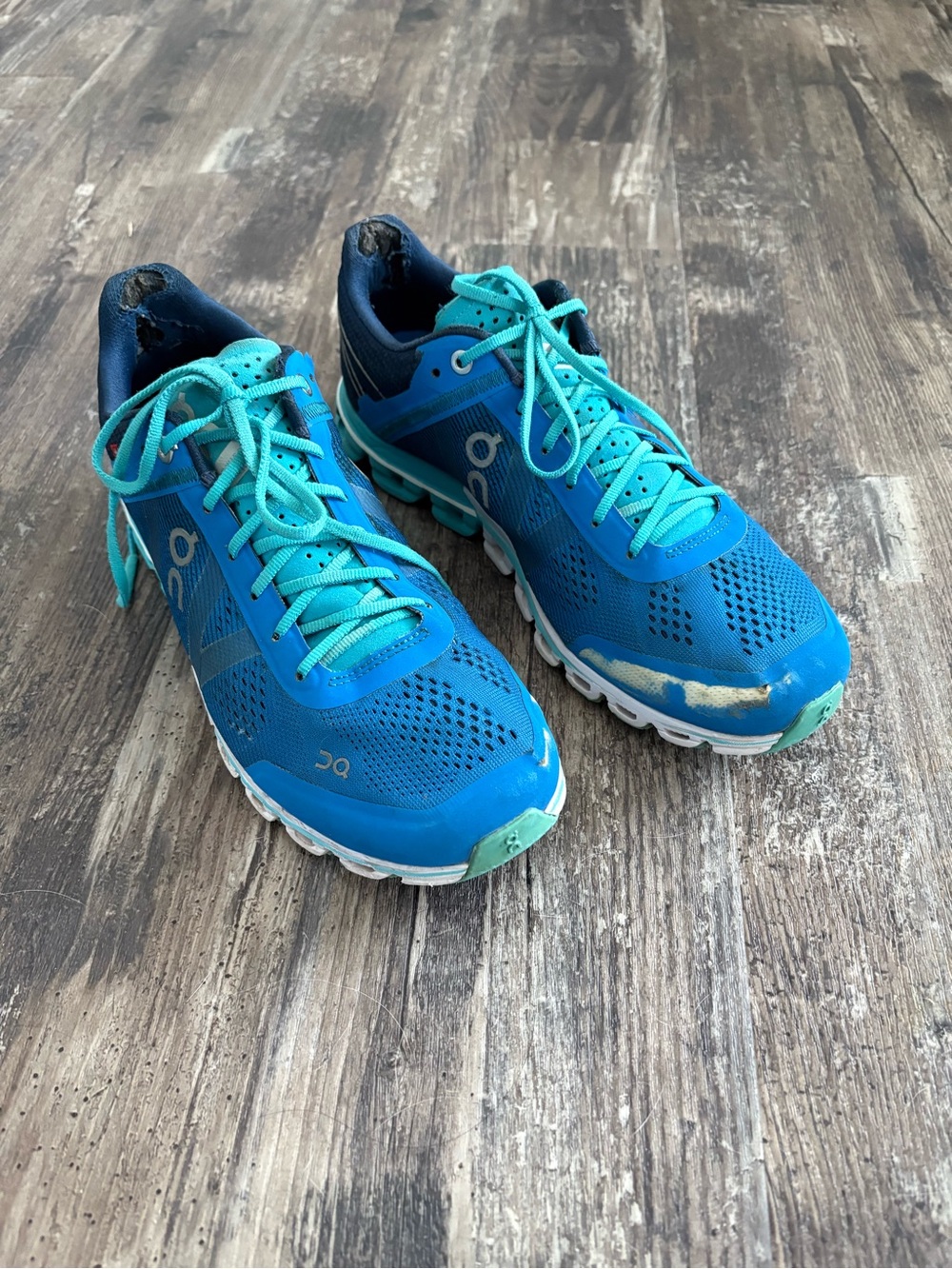 On Running Women's Cloudflow Athletic Sneakers in Blue with Teal Accents